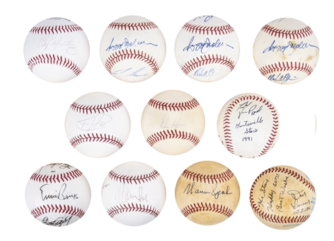 Lot of (11) Signed Baseballs Including Ichiro, Edgar Martinez, Nolan Ryan, Warren Spahn and Others (JSA Auction LOA)